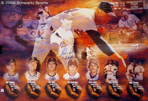 Nolan Ryan Autographed 7 No Hitters Litho 7 - Nolan Ryan signed 7 No Hitters collage lithograph with “7 No Hitters” inscription, This has also been signed by the 7 catchers of Ryan’s no hitters with the date they caught the game,The 7 catchers include Jeff Torborg, Art Kusnyer, Tom Egan, Ellie Rodriguez, Alan Ashby, John Russell, and Mike Stanley , This was signed at our Private Signing and comes with a an individually numbered; tamper evident hologram from Mounted Memories,